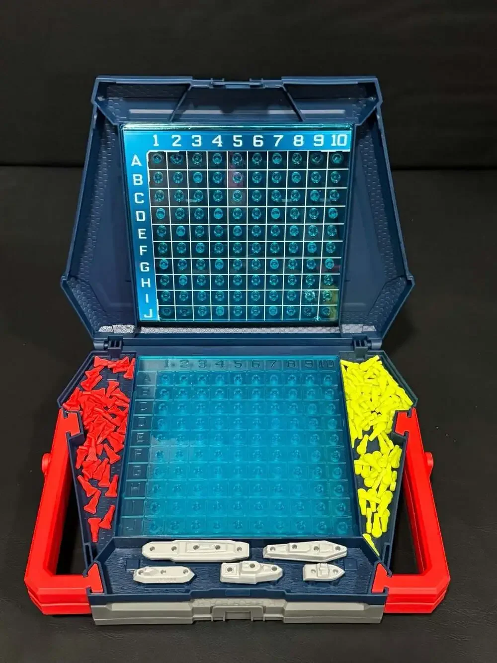 Hasbro Battleship Portable Strategy Board Game with Red and Yellow Pegs